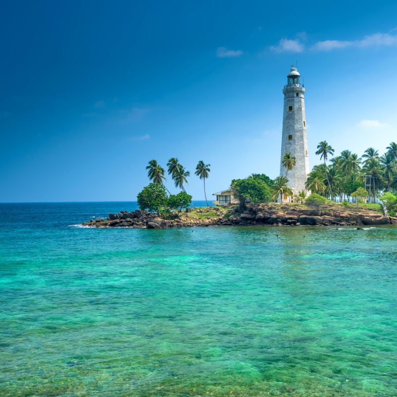 Beach and lighthouse in Sri Lanka