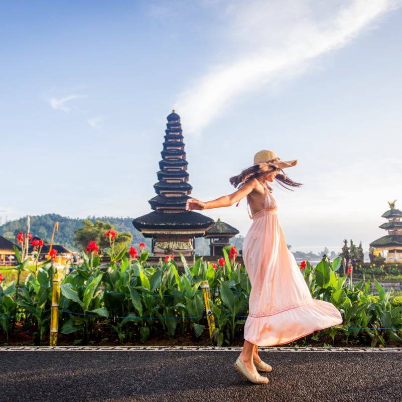 Woman in Bali in front of temple