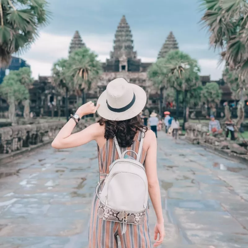 Woman looking at temple in Cambodia