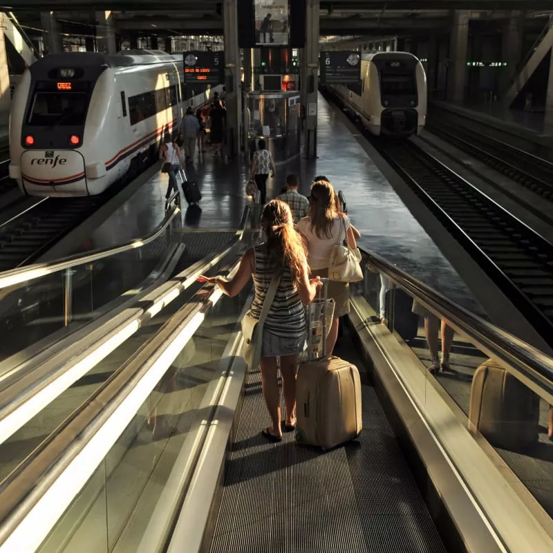 Women boarding Renfe train in Cordoba Spain. 