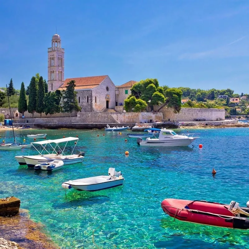 The Franciscan Monastery On The Shores Of The Turquoise Waters Of The Adriatic Sea, The Northern Arm Of The Mediterranean Sea, On The Island Of Hvar, Croatia, Southern Europe