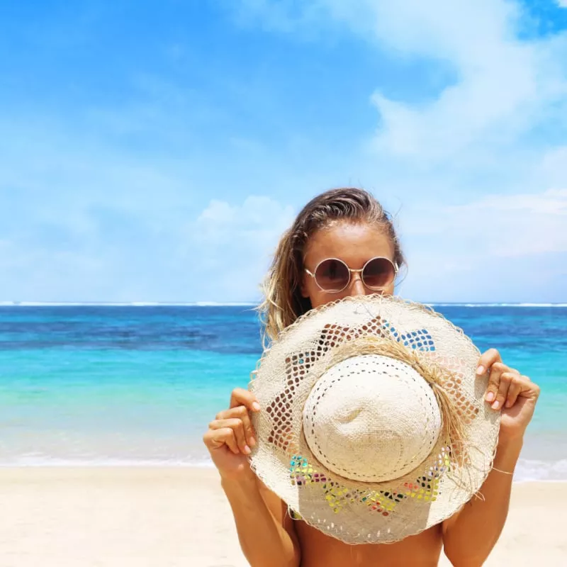 female traveler on the beach in the bahamas