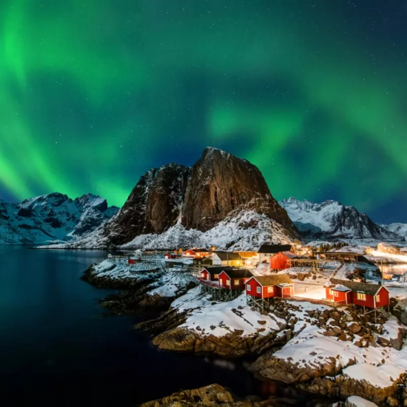 Aurora borealis over Hamnoy in Norway colorful