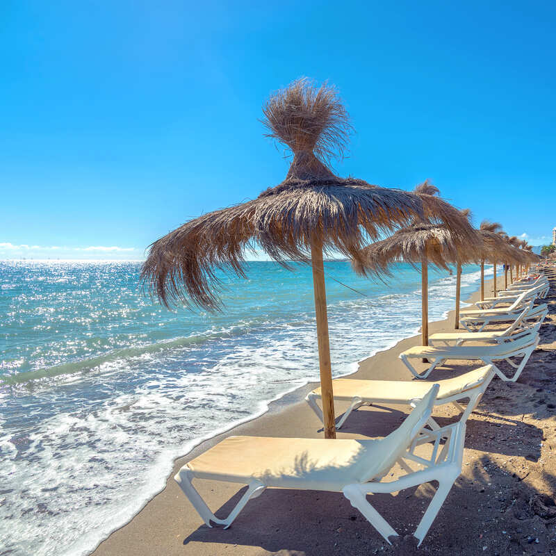 Beach Lounges In Malaga, Andalusia, Spain