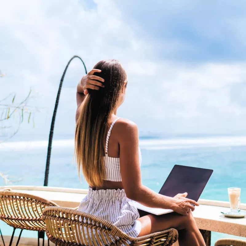 Woman with laptop in Bali