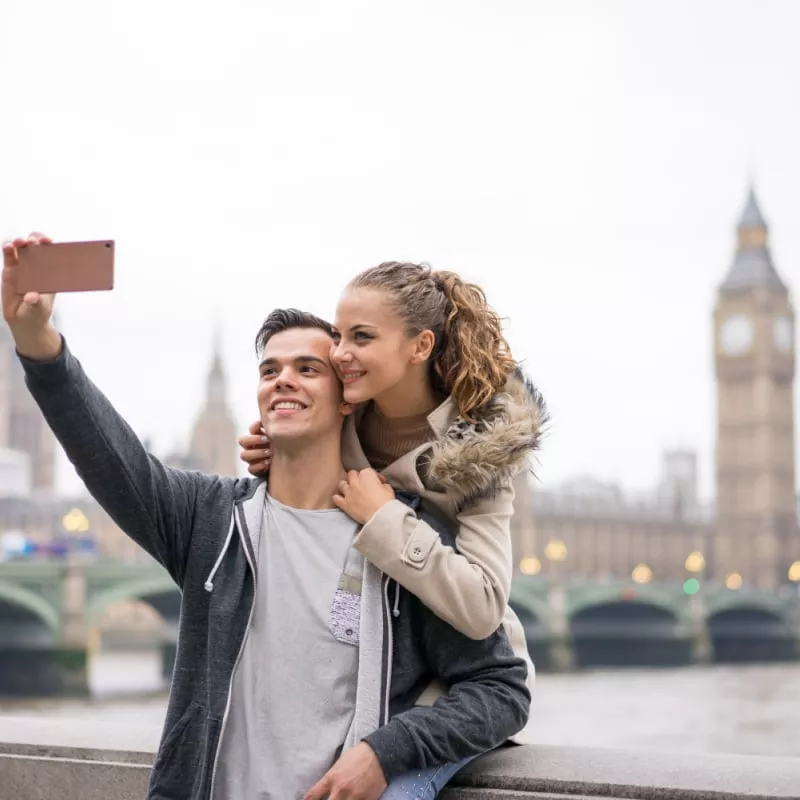 couple taking selfie in london