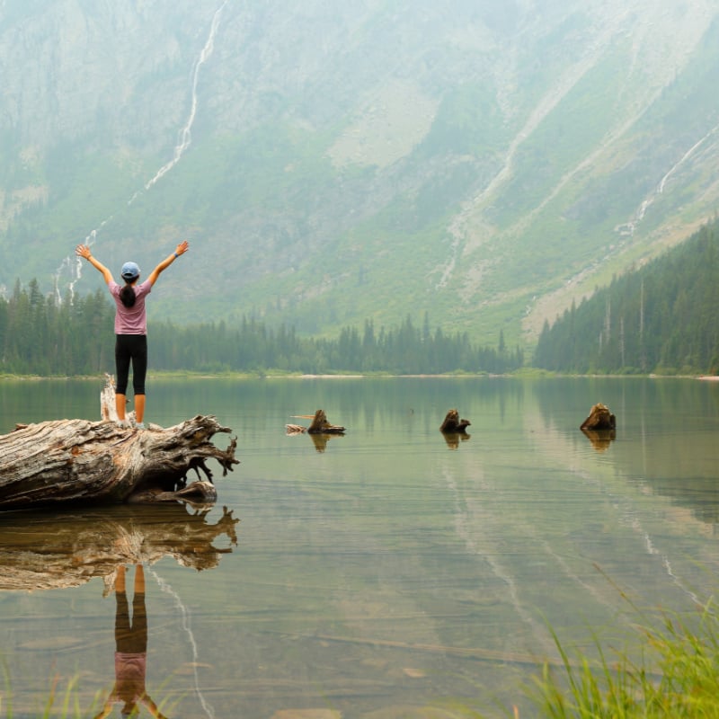 female tourist at avalanche lake