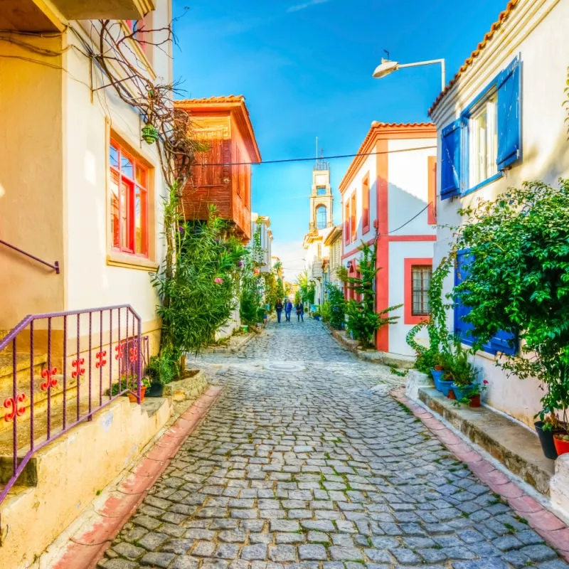 vibrant cobblestone street in bozcaada 