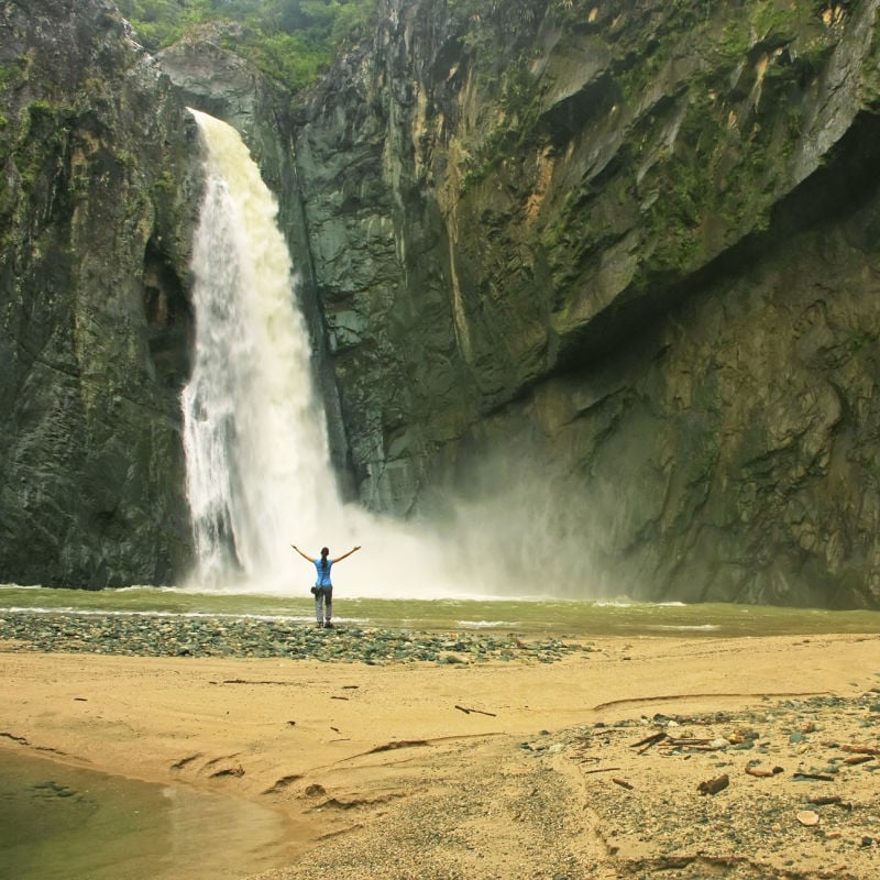 Woman in a waterfall in the Dominican Republic