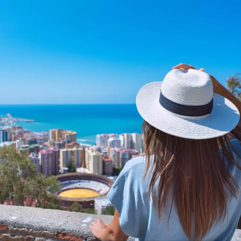 female traveler looking at city