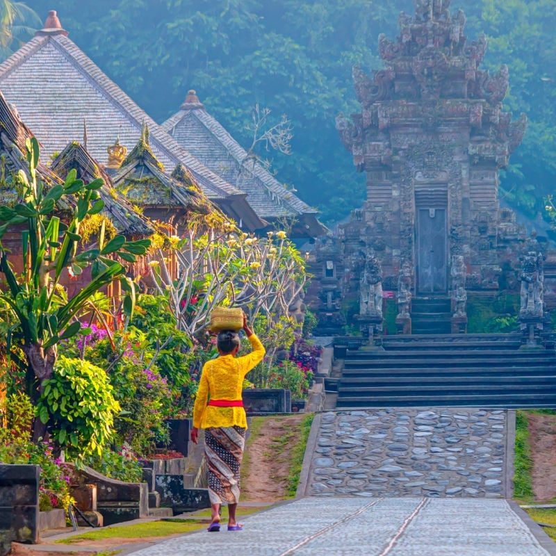 Woman Walking In A Village In Bali, Indonesia, Southeast Asia