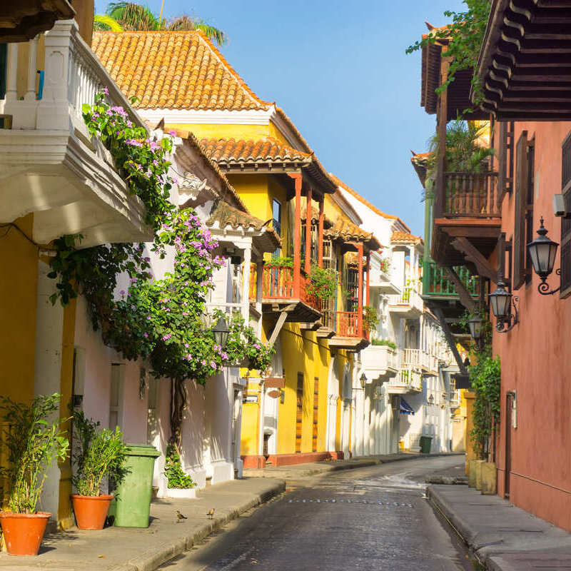 Colonial Era Street Lined With Historical Houses In The Old Center Of Cartagena, North Colombia, A City Straddling The Caribbean Coast, South America