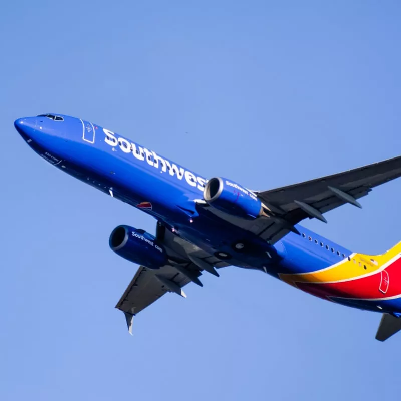 Southwest plane flying against a blue sky