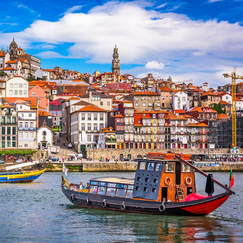 Porto, Portugal old town skyline from across the Douro River.