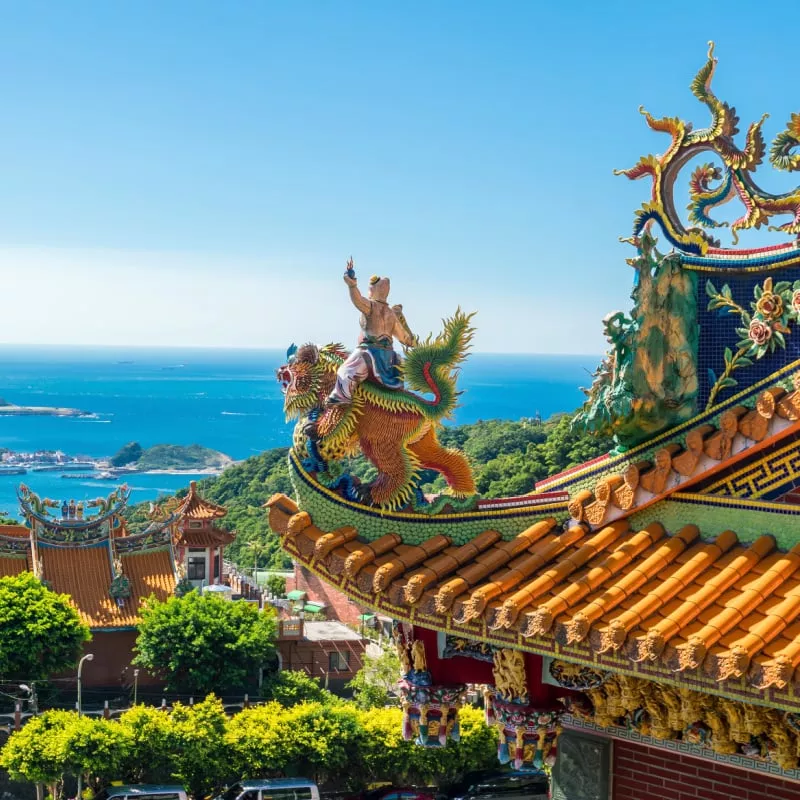 A Pagoda Temple Crowned With Dragon Statues In A Pagoda Temple In Taiwan Overlooking The China Sea, East Asia