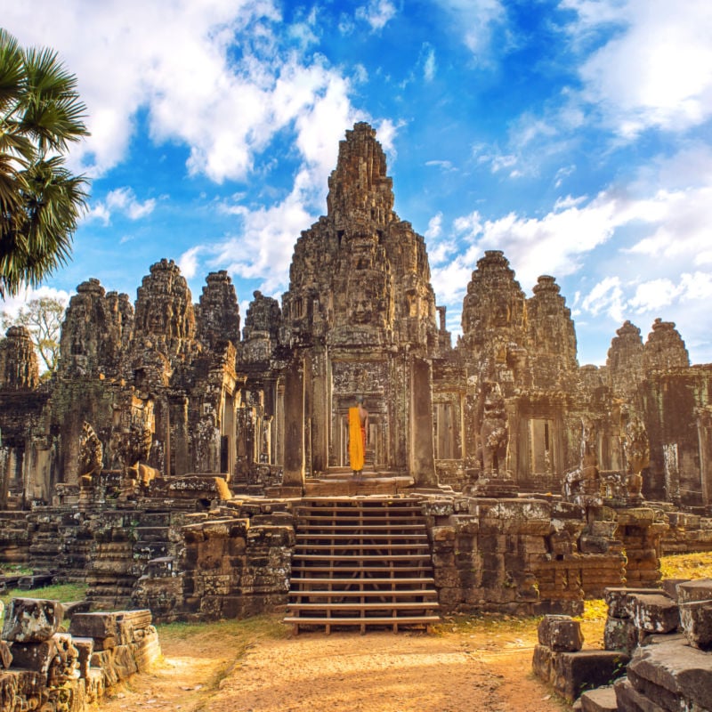 Ancient stone faces at sunset of Bayon temple, Angkor Wat, Siam Reap, Cambodia copy