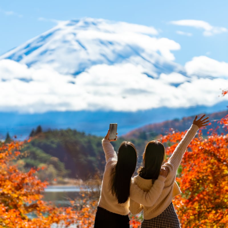 Happy women travel Japan on holiday vacation.