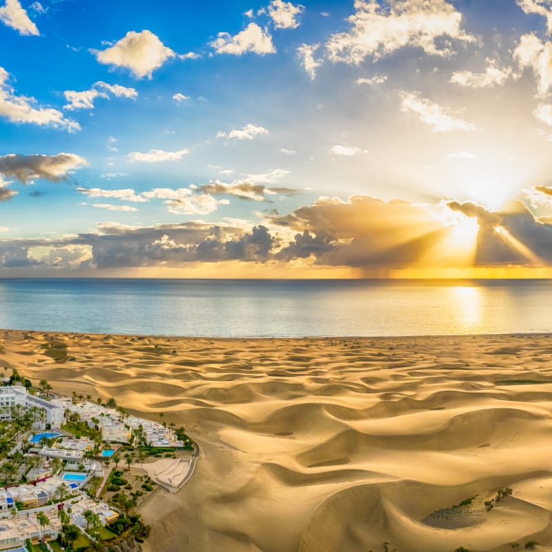 Landscape with Maspalomas town and golden sand dunes at sunrise, Gran Canaria, Canary Islands, Spain