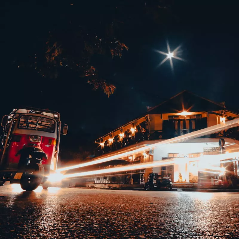 Luang Prabang at night colonial building and tuk tuk