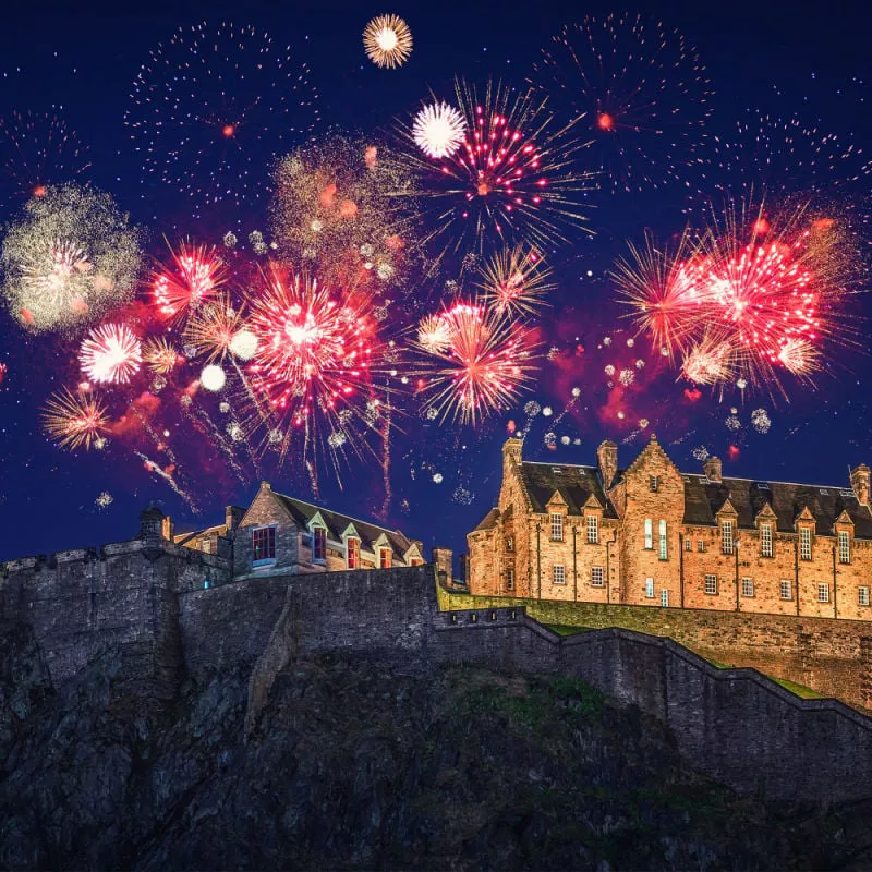 The castle of Edinburgh with fireworks during Hogmanay