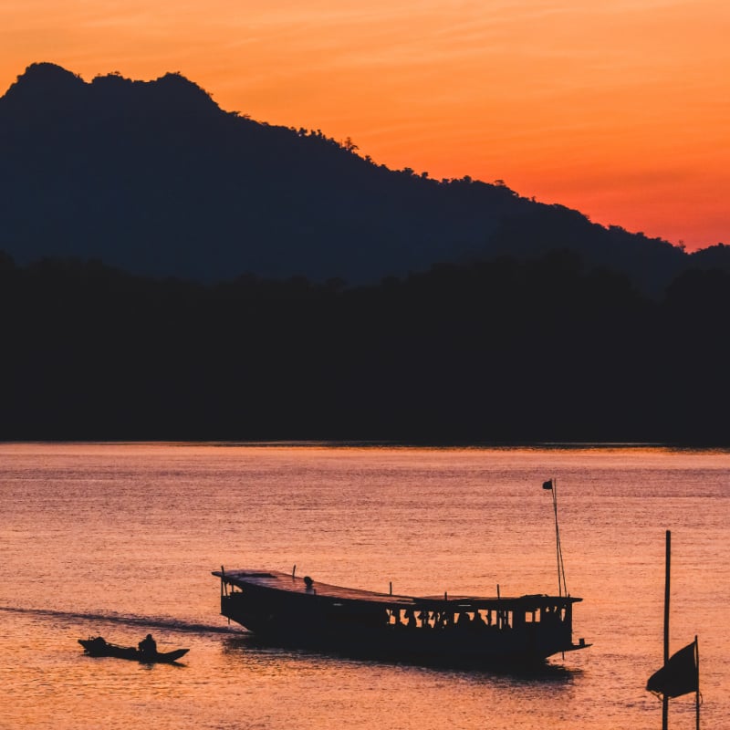 a river cruise on the mekong in luang prabang laos