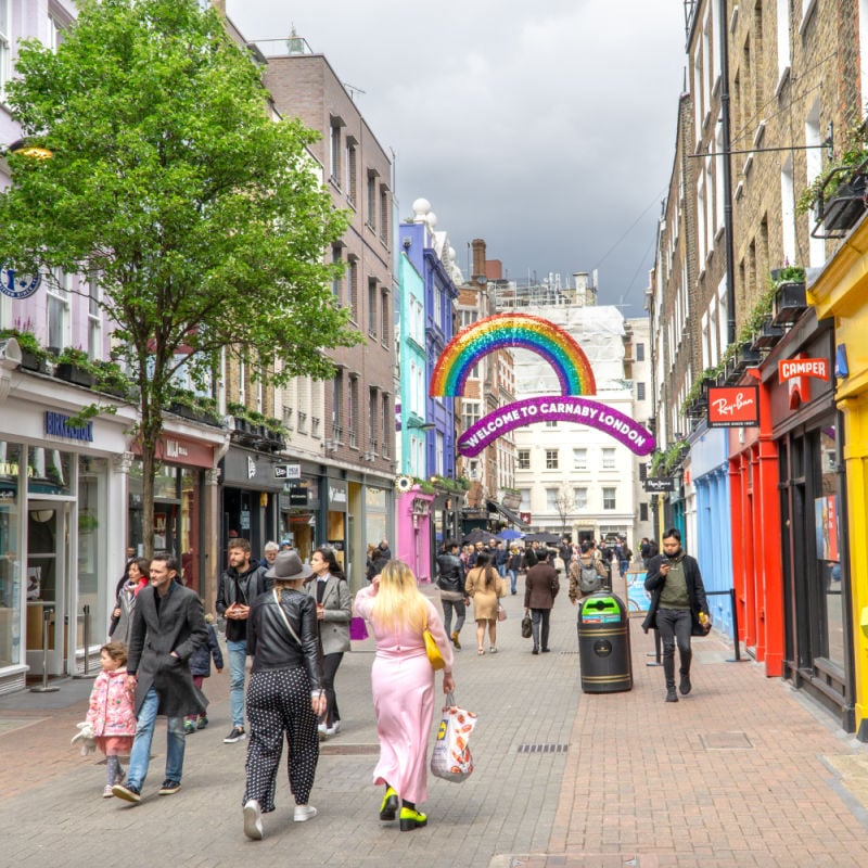 shoppers walking down the London street