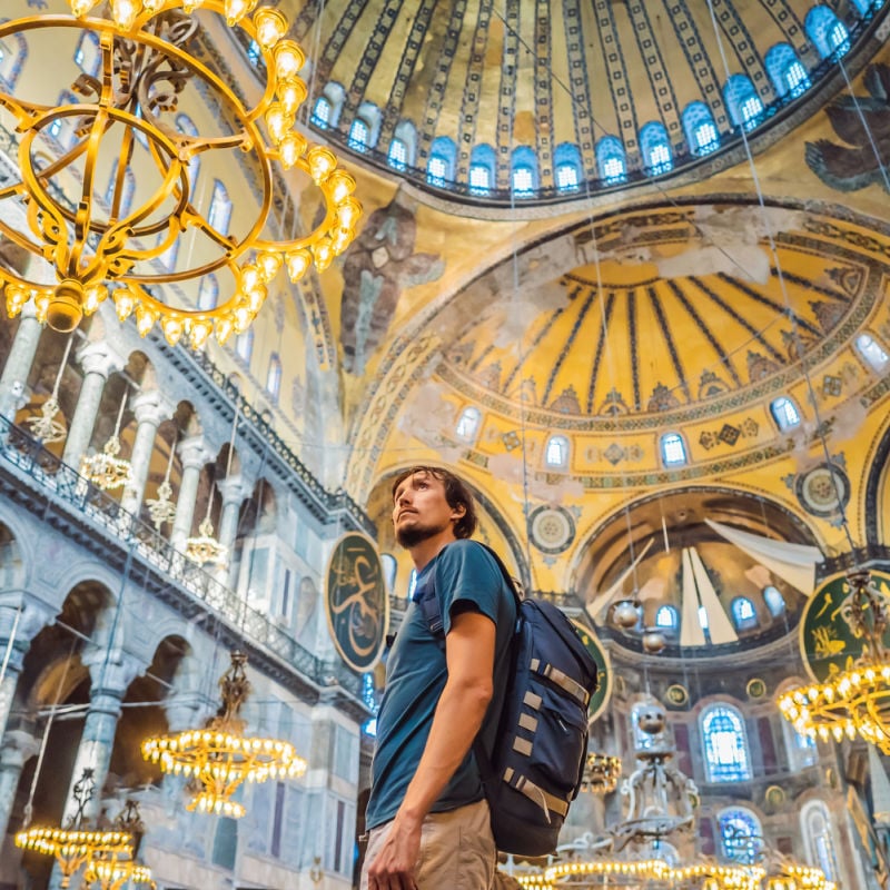 male tourist inside hagia sofia mosque