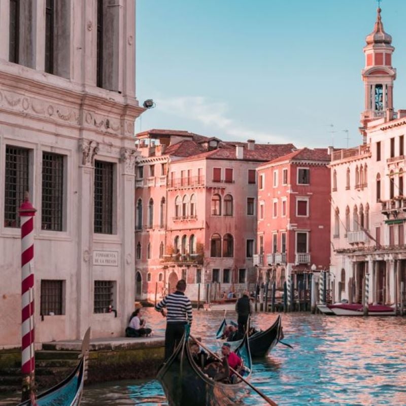 Gondolas in a canal in Venice