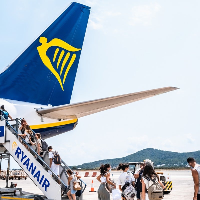 Tourists Boarding A Ryanair Flight In Europe