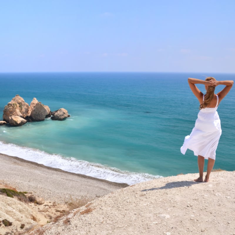 Girl looking to the sea near Aphrodite birthplace, Cyprus