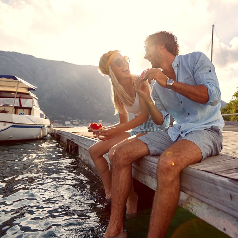 couple laughing at the lake