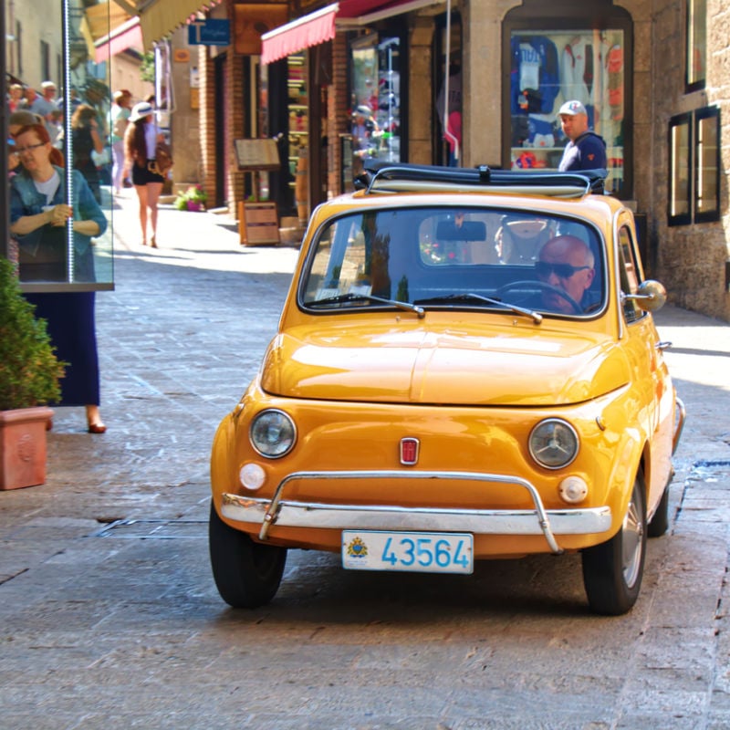 Fiat on narrow street in San Marino