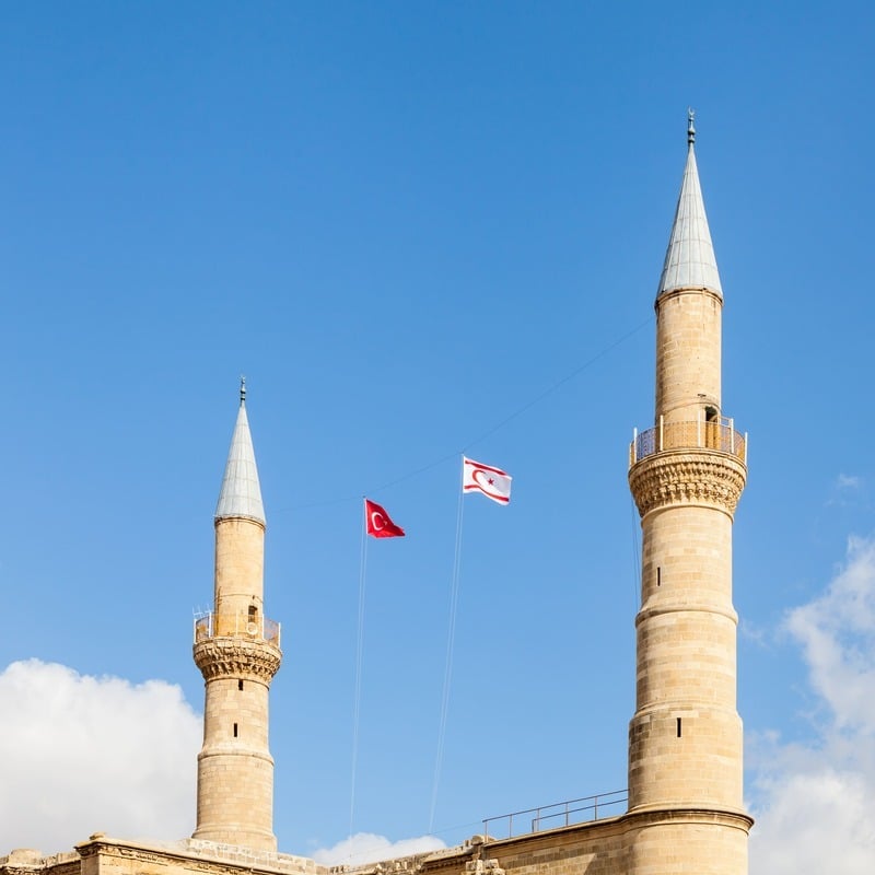 Flags Of Turkey And The Turkish Republic Of Northern Cyprus Strung Between The Minarets Of The Selimiye Mosque In North Nicosia, Northern Cyprus