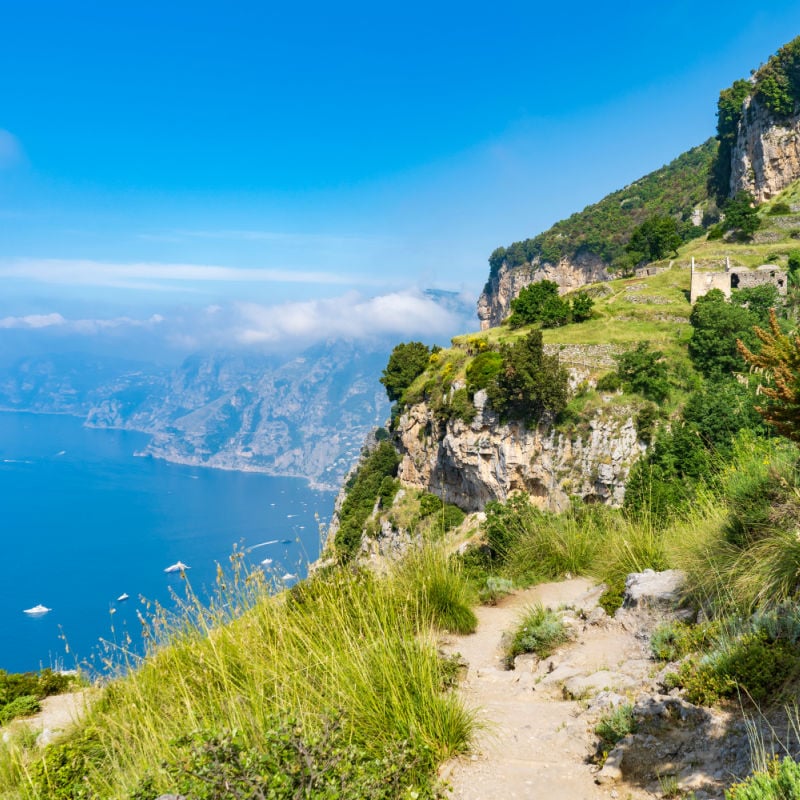 view down to sea from the path of the gods hike in amalfi italy