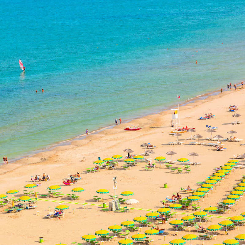 Aerial View Of Golden Sand Beach In Rimini, An Italian Resort City In The Adriatic, Mediterranean Sea, Italy, Southern Europe