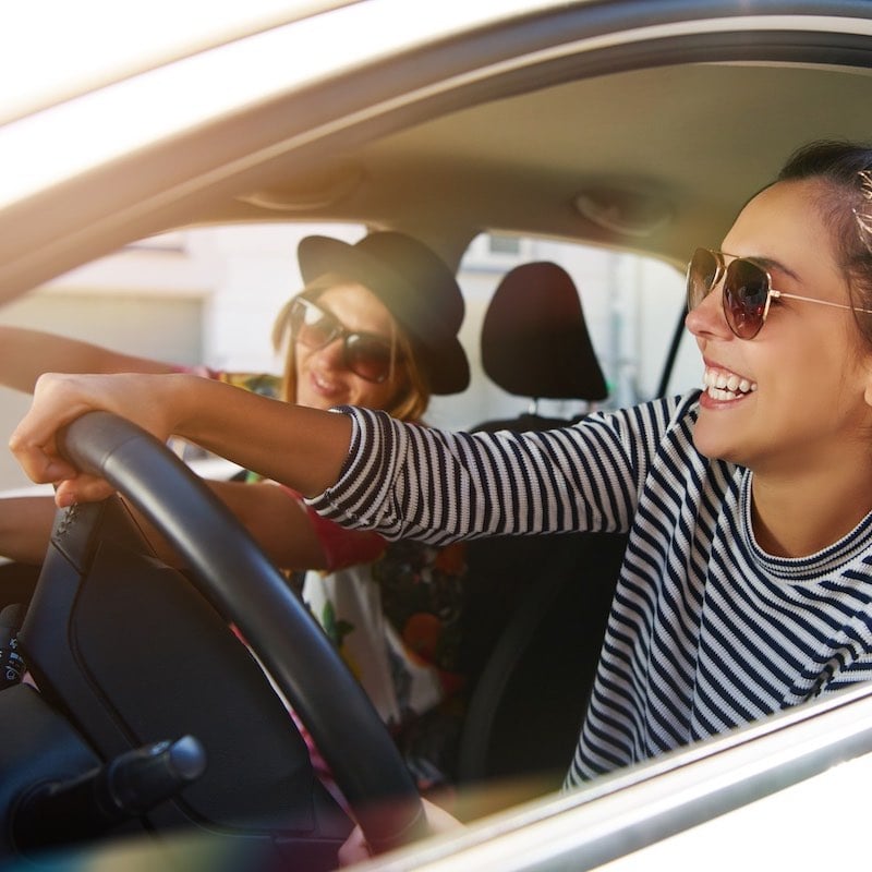 Two women driving in a car