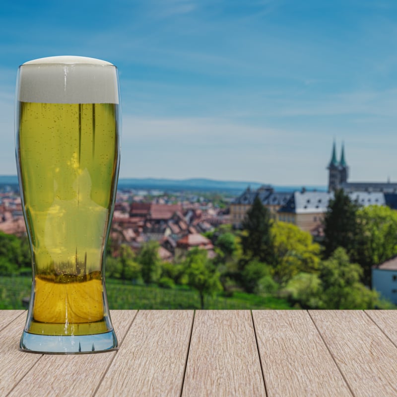 Beer glass at restaurant patio with sweeping views of Bamberg