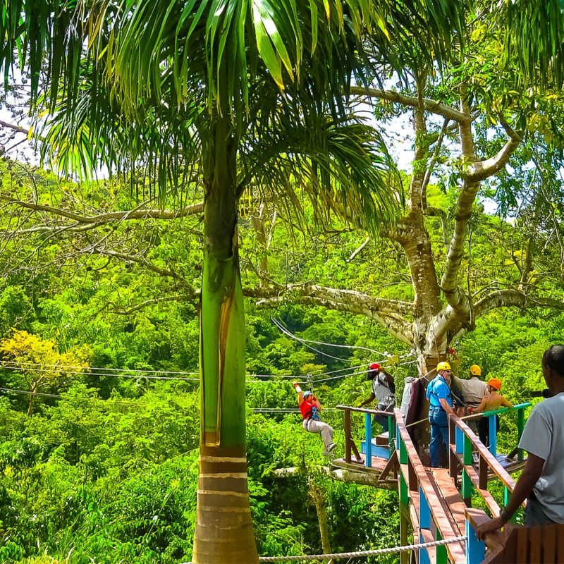 Woman going on a jungle zipline adventure in Antigua and Barbuda