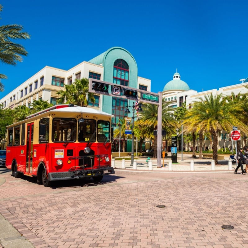 Cityscape view of the the popular West Palm Beach downtown district with City Hall along Clematis Street.