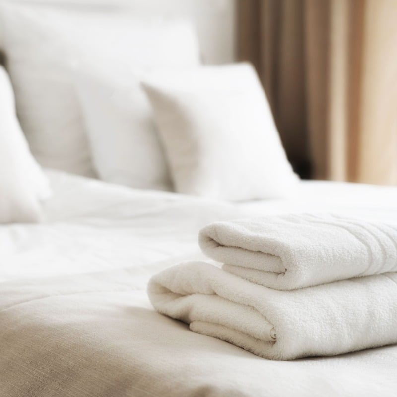 Towels folded in a hotel bed