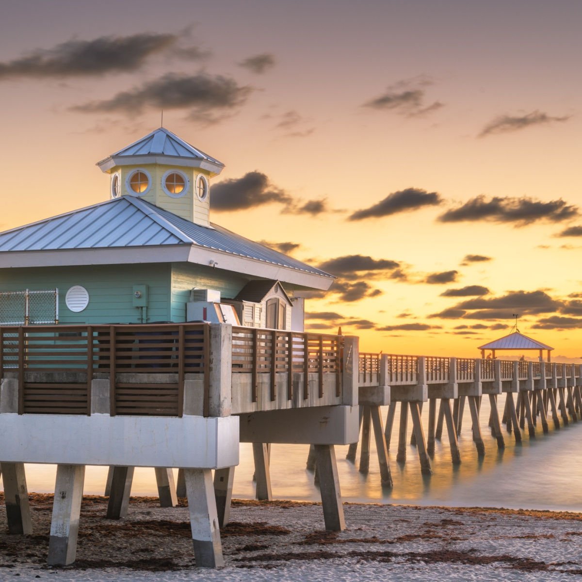 Juno, Florida, USA at the Juno Beach Pier just before sunrise.