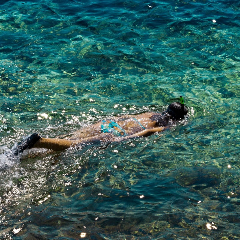 Snorkeler in turquoise water