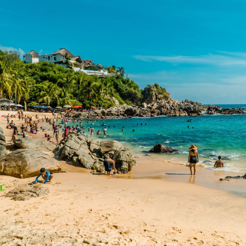 People on the beach in Puerto Escondido