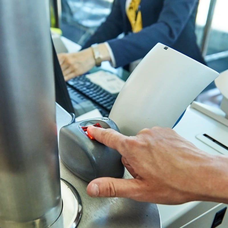 Person Giving Fingerprint During Screening Process At Airport Border Control Or Check In, International Travel