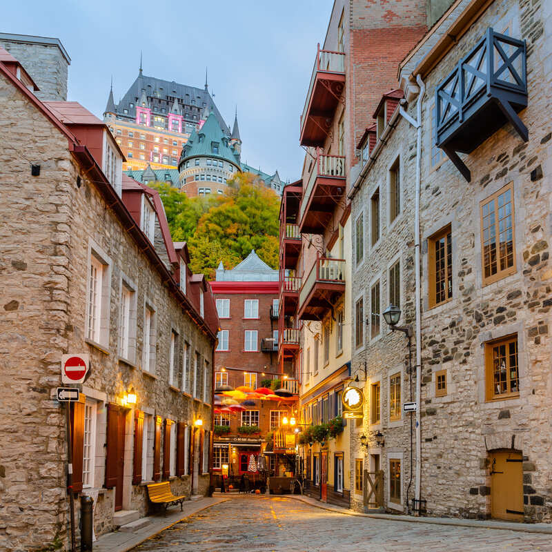 The High Tower Of Fontenac Castle Hotel Seen From The Lower Old Town Of Quebec City, Canada, North America