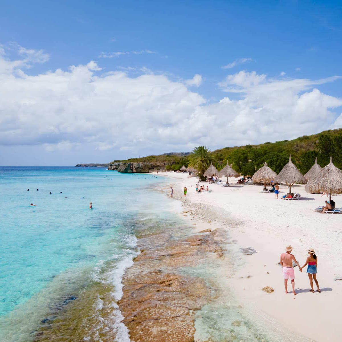 Tourists Sipping On Drinks By The Caribbean Sea, Curacao