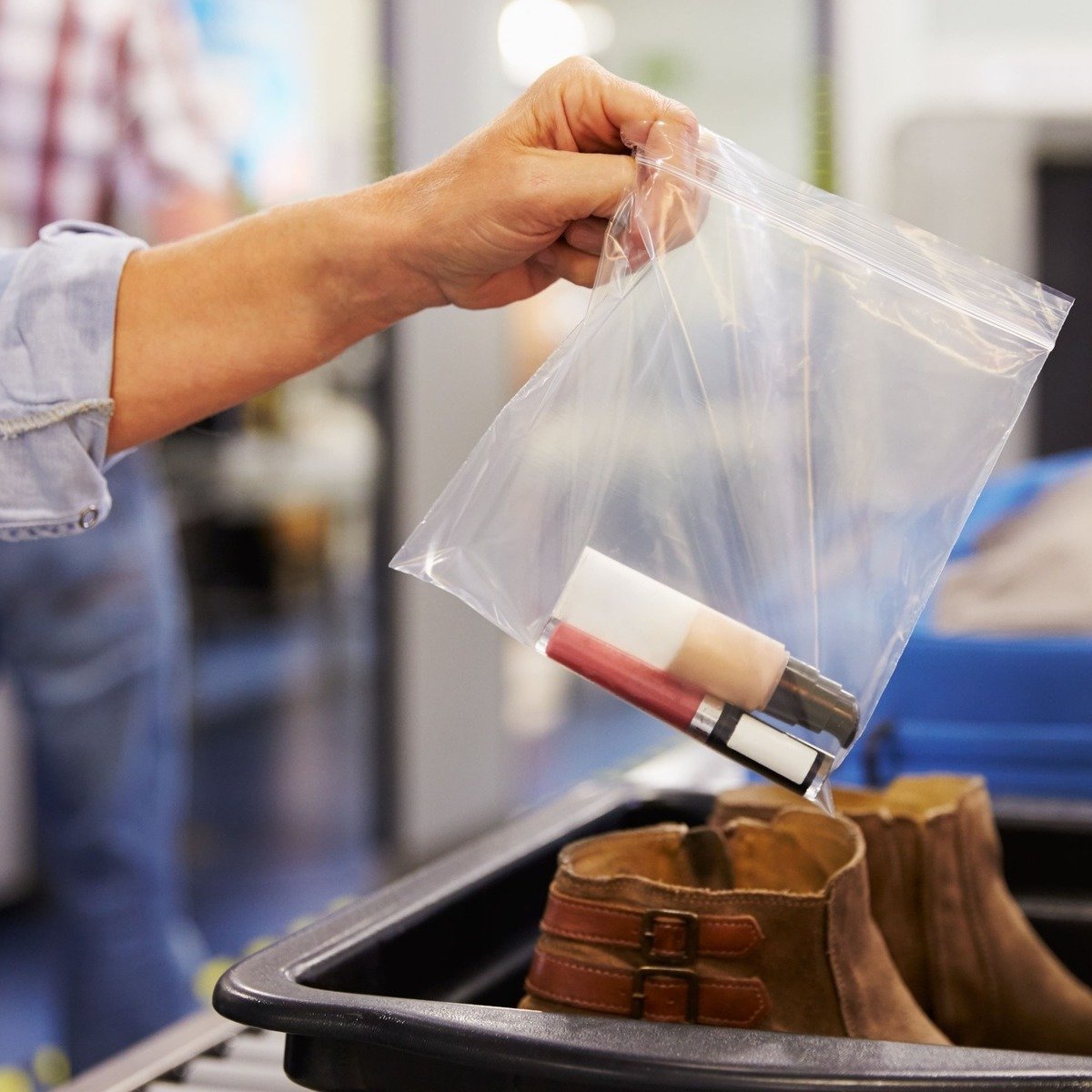 Traveler Going Through Security Check At The Airport