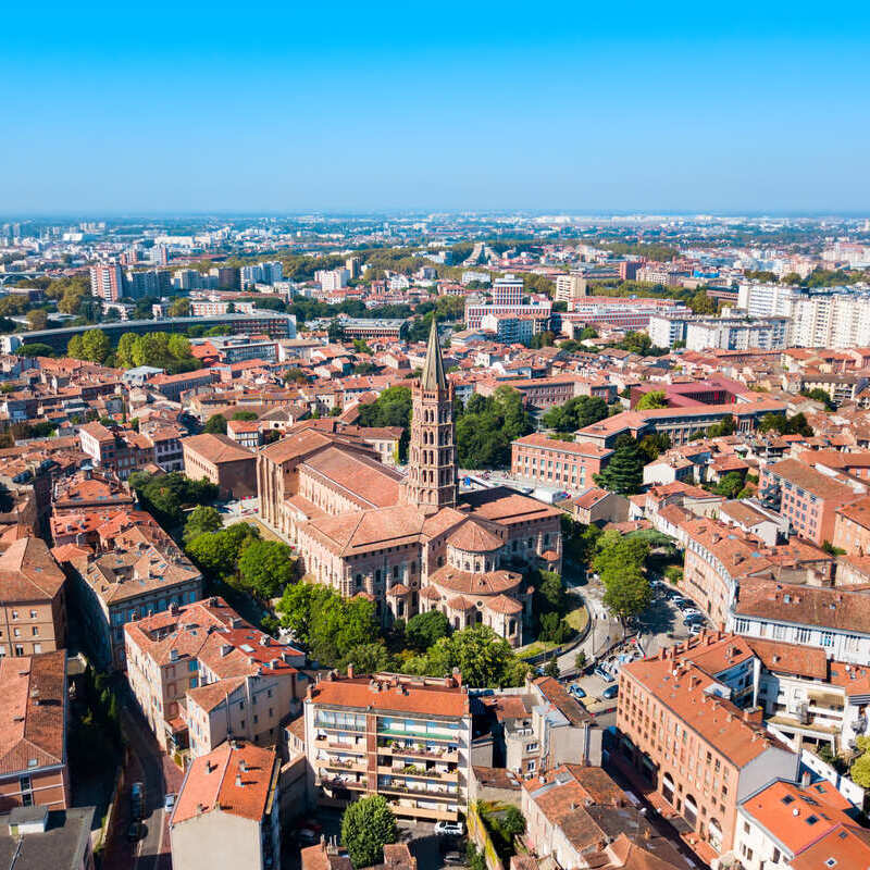 Aerial View Of Basilique Saint-Sernin de Toulouse And The Historic City Center Of Toulouse, France