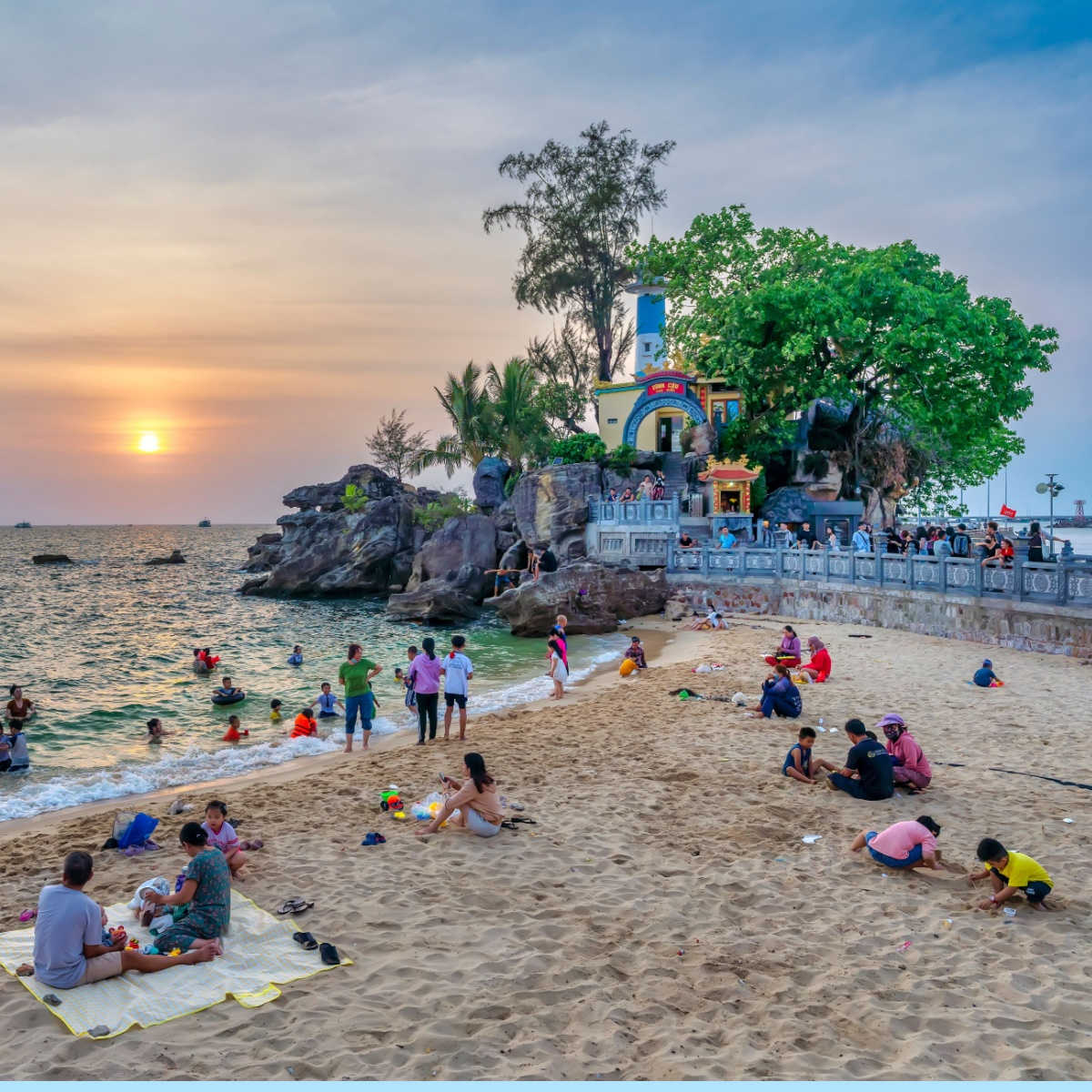 Tourists visiting the temple and lighthouse of Dinh Cau on the Phu Quoc island, Vietnam