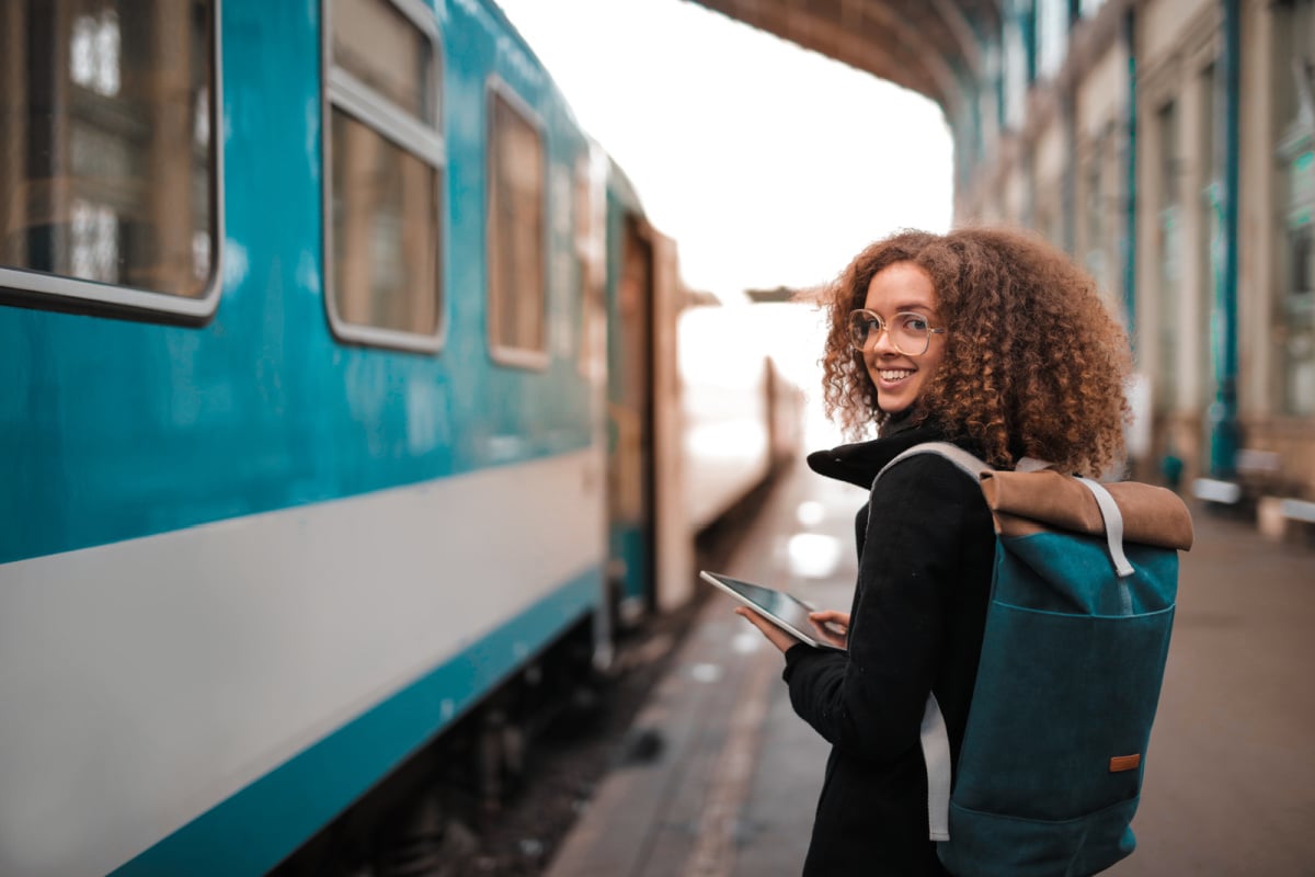 Young traveler at train station in winter